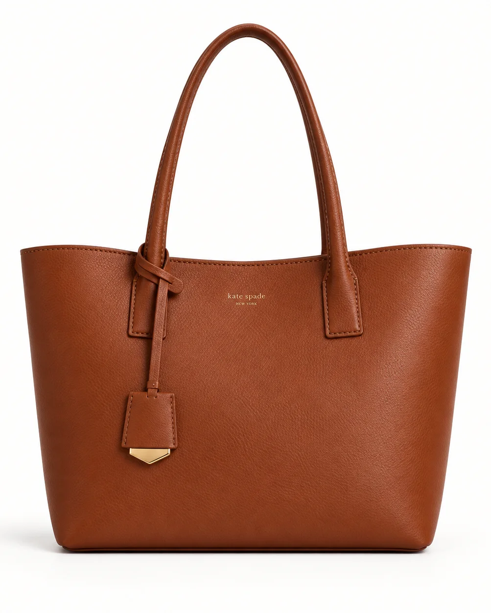 Brown leather handbag photographed against a clean studio background