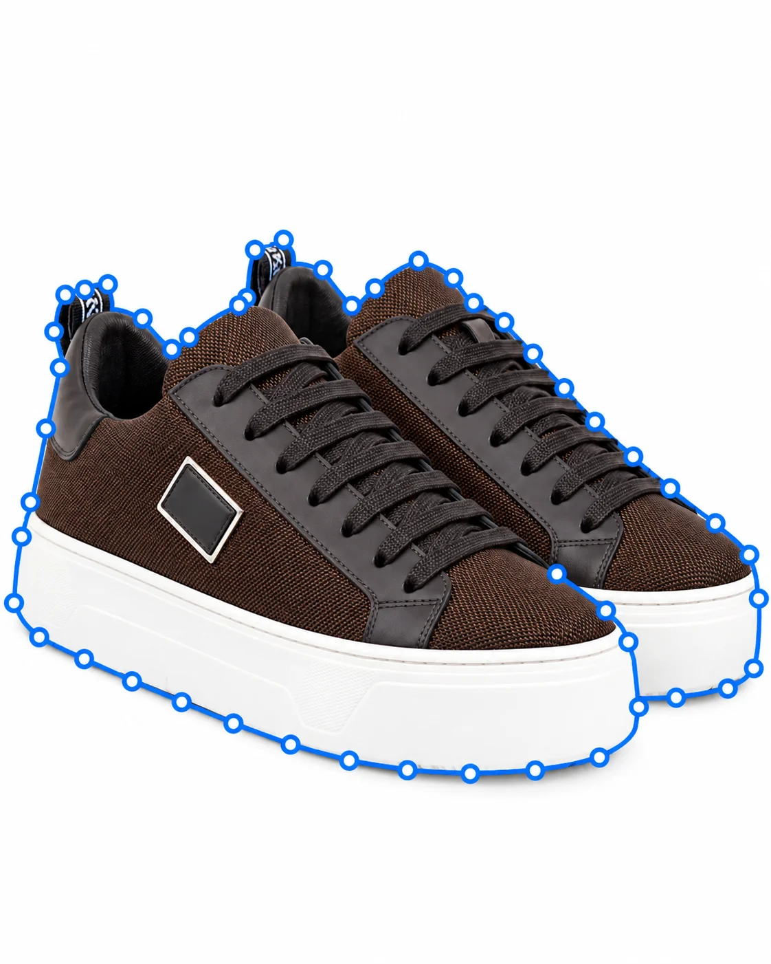 Pair of dark sneakers outlined with detailed pen-tool path points