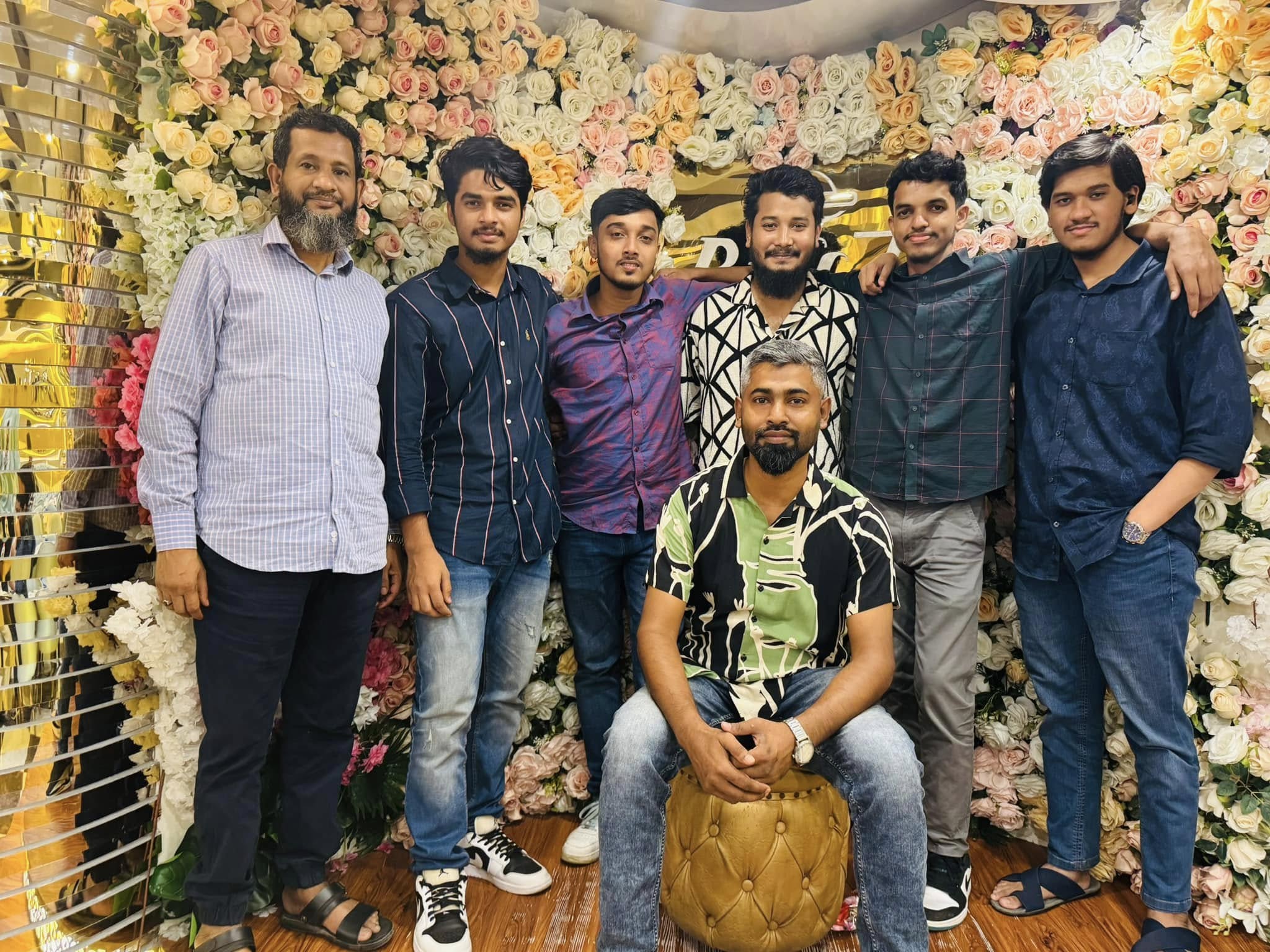 Studio Click House colleagues posing during annual buffet celebration