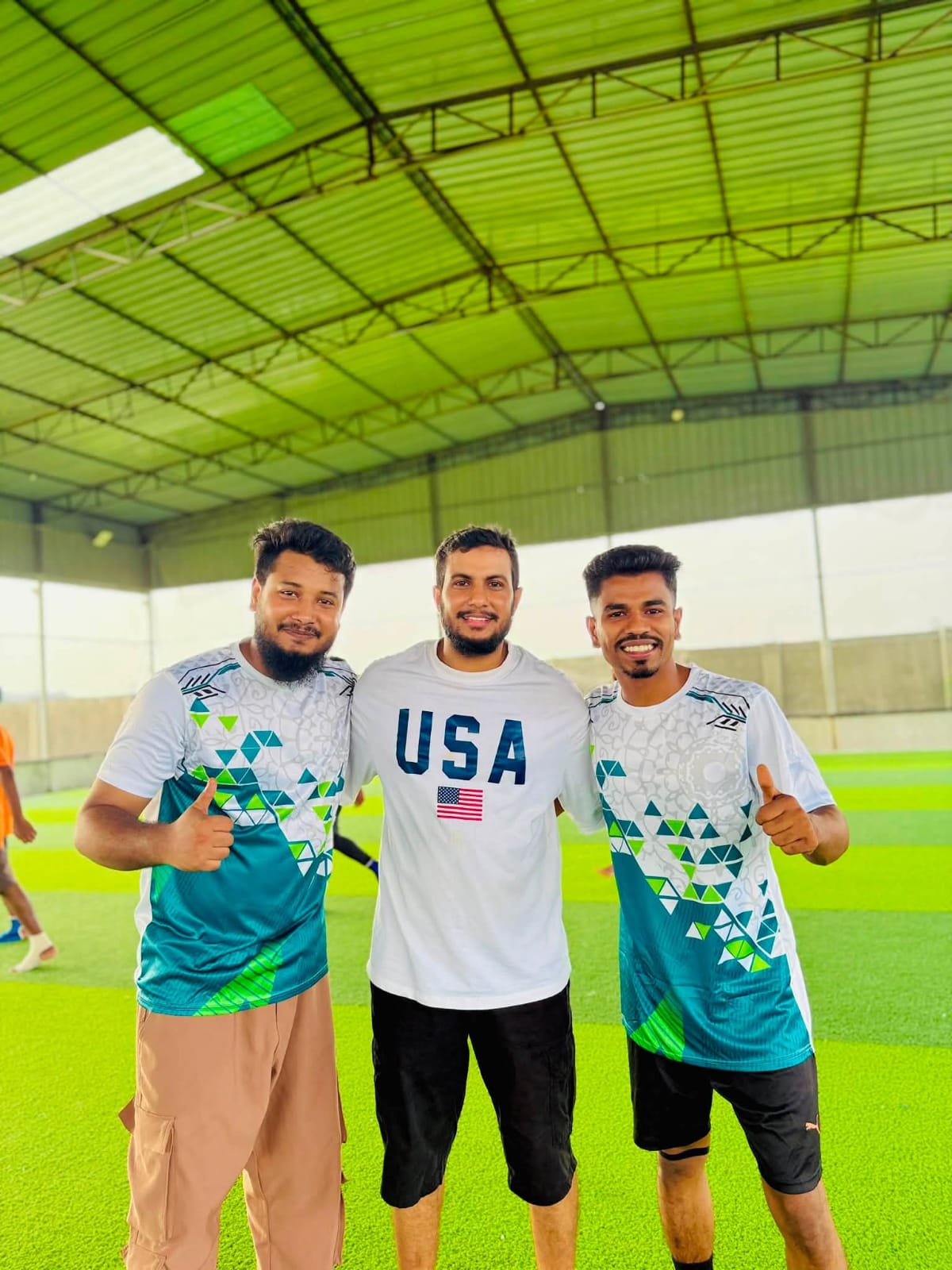 Studio Click House team goalkeeper in focus during evening match