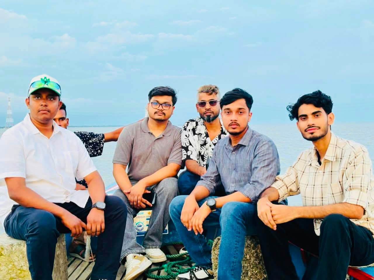 Studio Click House crew gathered at traditional Mawa fish feast