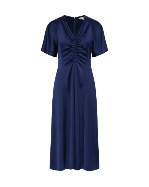 Black couture evening gown with sculptural ruffle detailing on a ghost mannequin